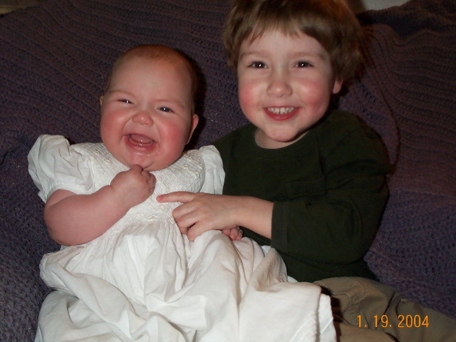 Just try getting two kids to smile at once!