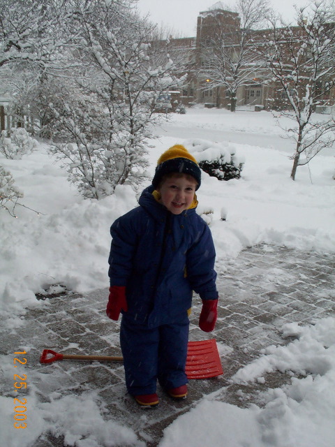 It snowed all day on Christmas, and Will helped shovel.