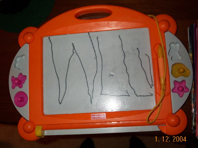 He came to show me what he wrote on the magnadoodle one afternoon.  "I made three Ls because its an important letter."