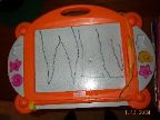 He came to show me what he wrote on the magnadoodle one afternoon.  "I made three Ls because its an important letter."